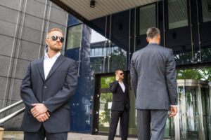 Bodyguards outside an office building